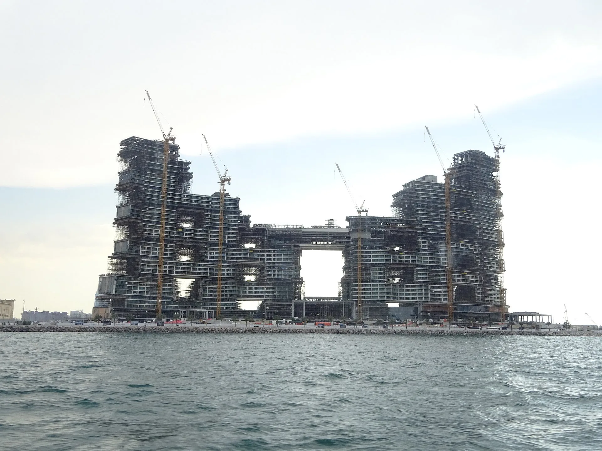 Atlantis The Royal Dubai infinity pool sky met Palm Jumeirah skyline